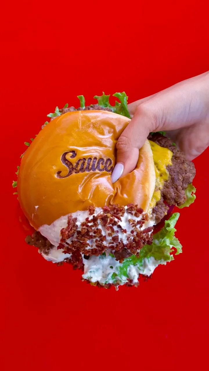Sauce burger rolled in crispy beef bacon